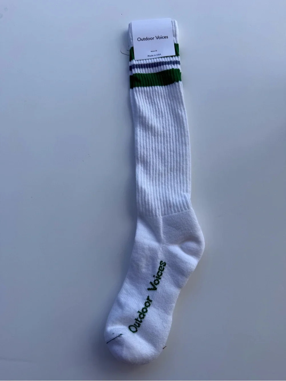 Outdoor Voices White Crew Socks with Green Stripes and Logo